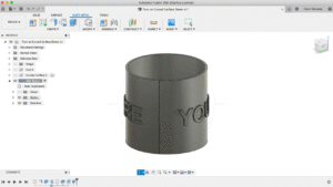 Example text that wraps around a curved body in Fusion 360